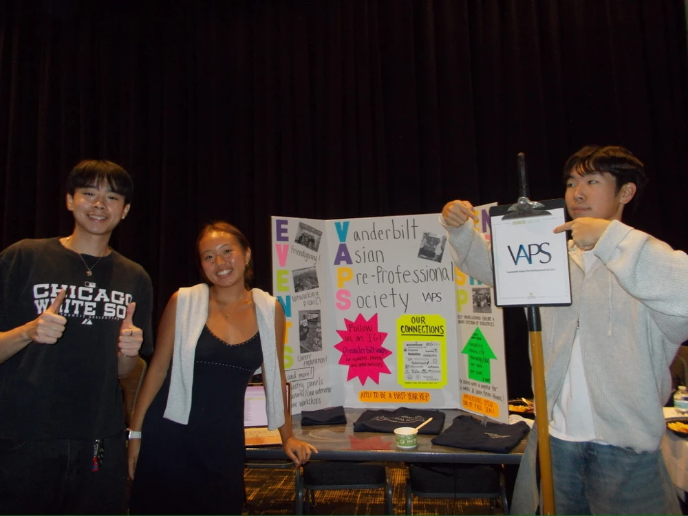 Friends at the VAPS student organization table